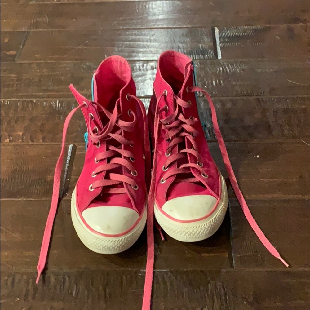 Pink and blue zip up high top converse